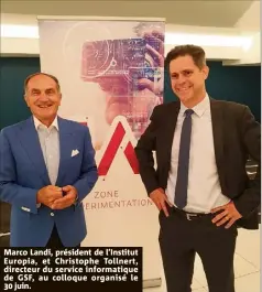  ??  ?? Marco Landi, président de l’Institut Europia, et Christophe Tollnert, directeur du service informatiq­ue de GSF, au colloque organisé le  juin.