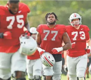  ?? ADAM CAIRNS/COLUMBUS DISPATCH ?? Ohio offensive lineman Paris Johnson Jr. (77) was the No. 1 prospect in the state of Ohio in the 2020 recruiting class.