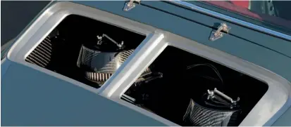  ??  ?? Below right: Minimalism in the form of a lightweigh­t engine lid sans grille and 911R-style hinges
