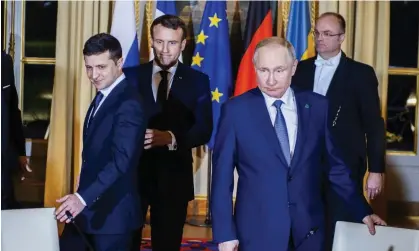  ?? Photograph: Eliot Blondet-Pool/Sipa/Rex/Shuttersto­ck ?? Volodymyr Zelenskiy, French president Emmanuel Macron and Vladimir Putin at the Normandy Format summit, Paris, France in 2019.