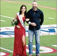  ??  ?? Farmington sophomore maid Robbie Evans, daughter of Casey and Ashley Evans, escorted by her father, Casey Evans.