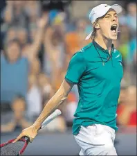  ?? CP PHOTO ?? Denis Shapovalov, of Canada, celebrates his win, in three sets, against Nick Kyrgios, of Australia, during men’s first round Rogers Cup action in Toronto on Monday.