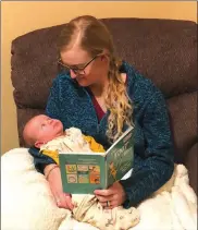 ?? Meghan G’Schwind ?? Above, Meghan G’Schwind passes on the love of reading to her son, Wade.