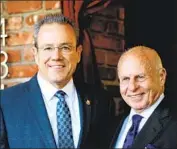  ?? Amanda Edwards Getty Images ?? TOM GIRARDI, right, with LAPD Chief Michel Moore at Feinstein’s at Vitello’s supper club in Studio City in 2019, has contribute­d millions to candidates.