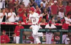  ?? AFP ?? Soaring performanc­e Mike Trout of the Los Angeles Angels trots home after hitting a solo home run in the third inning against the New York Yankees at Angel Stadium in Anaheim, California on Monday.