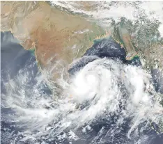  ??  ?? A satellite image obtained courtesy of the National Oceanic and Atmospheri­c Administra­tion (NOAA) shows Tropical Cyclone Fani intensifyi­ng in the Bay of Bengal.