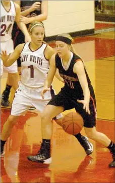  ?? Mark Humphrey NWA Media ?? Pea Ridge junior Mikheala Cochran drives with a left-handed dribble against the defense of Lincoln’s Shelby Rowe. Cochran scored 5 points in the Blackhawks’ 46-38 loss to Lincoln in the first-round of the District 4A-1 girls basketball tournament at...