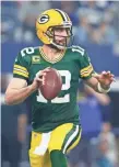  ?? TIM HEITMAN, USA TODAY SPORTS ?? Aaron Rodgers’ excellence was on full display in the Packers’ playoff win Sunday.