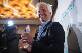  ?? CP FILE PHOTO ?? Chris Carter, creator of the television show The X-Files, holds a trophy after being presented with the Vancouver Internatio­nal Film Festival Industry Builder Award in Vancouver on Oct. 7, 2016.