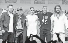  ?? KEVIN WINTER, GETTY IMAGES ?? Marvel didn’t take up all the limelight. Justice League stars Ben Affleck, left, Ezra Miller, Gal Gadot, Ray Fisher and Jason Momoa also thrilled fans.