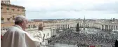  ?? ?? Pope Francis delivers his traditiona­l Christmas Day Urbi et Orbi from the main balcony of
St. Peter’s Basilica at the Vatican