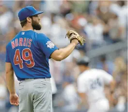  ?? ADAM HUNGER/GETTY ?? Daniel Norris reacts after giving up a home run to Matt Carpenter during the second inning on Sunday.