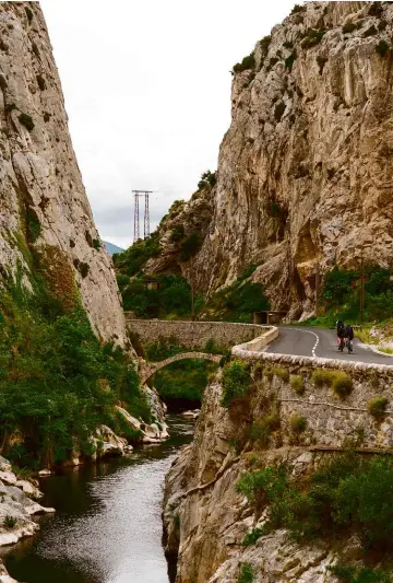  ?? ?? Left: From the Col de Roque-jalere the road rises out of the landscape towards the Gorges de Galamus