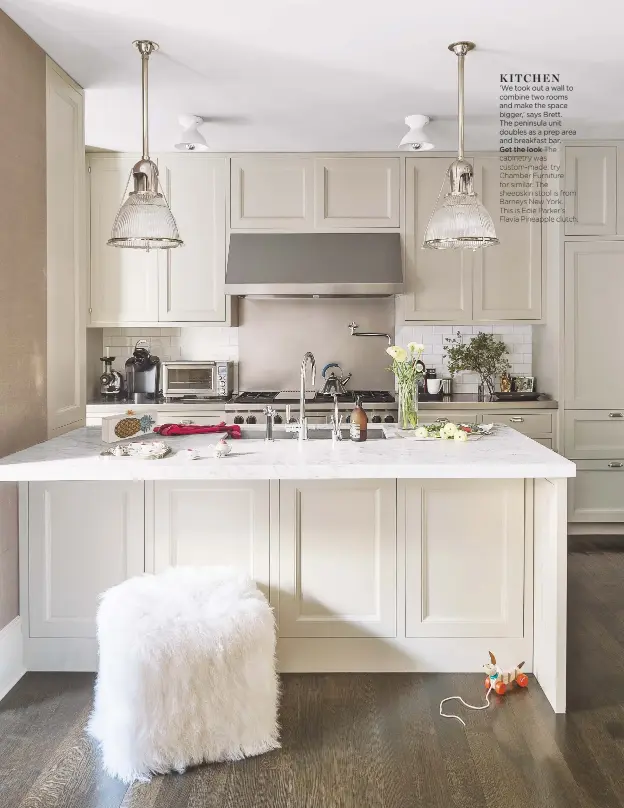  ??  ?? Kitchen
‘We took out a wall to combine two rooms and make the space bigger,’ says Brett.
The peninsula unit doubles as a prep area and breakfast bar.
Get the look The cabinetry was custom-made; try Chamber Furniture for similar. The sheepskin stool...