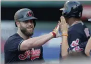  ?? ASSOCIATED PRESS FILE ?? Mike Napoli is congratula­ted by teammates after hitting a three-run home run in 2016 with the Indians.