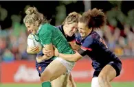  ?? AP ?? Ireland’s Alison Miller (centre) is caught by France’s Caroline Ladagnous and Montserrat Amedee. —