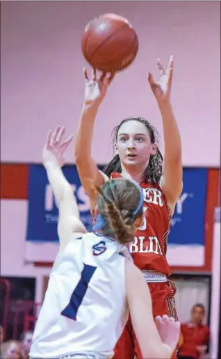  ?? PETE BANNAN — DIGITAL FIRST MEDIA ?? Upper Dublin’s Jess Polin puts a shot over Cardinal O’Hara’s Kerry Patterson in a PIAA Class 6A firstround game.