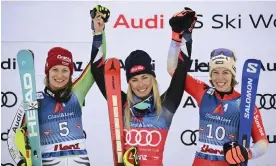  ?? ?? Mikaela Shiffrin of the United States stands on the podium with Germany’s Lena Duerr, left, and Switzerlan­d’s Michelle Gisin, right, after Friday’s World Cup slalom in Lienz, Austria Photograph: Hans Peter Lottermose­r/Getty Images