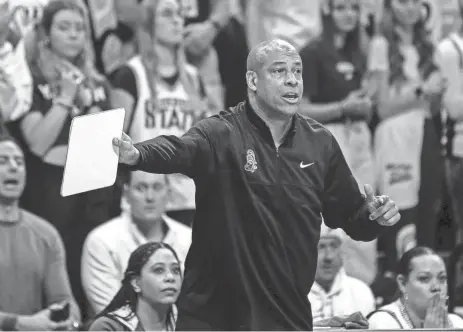  ?? JUNFU HAN/DETROIT FREE PRESS ?? Michigan State assistant coach Mark Montgomery reacts to a play against Michigan during the second half of MSU’s 81-62 win over Michigan on Jan. 30 in East Lansing.