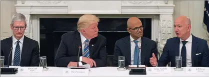  ??  ?? Hi-tech high table: the President with (from left) CEOs Tim Cook of Apple, Satya Nadella of Microsoft and Jeff Bezos of Amazon