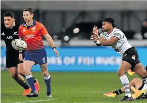  ?? Photo: FRU Media ?? Fiji Airways Flying Fijians halfback, Simione Kuruvoli spins a pass during their Test against the All Blacks at Forsyth Barr Stadium, Dunedin, on July 10, 2021.