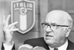  ??  ?? Italian Football Federation (FIGC) President Carlo Tavecchio gestures during a press conference after he resigned as Italy’s World Cup qualifying fiasco saw the four-time champions miss the finals for the first time in 60 years, on November 20, 2017 in...