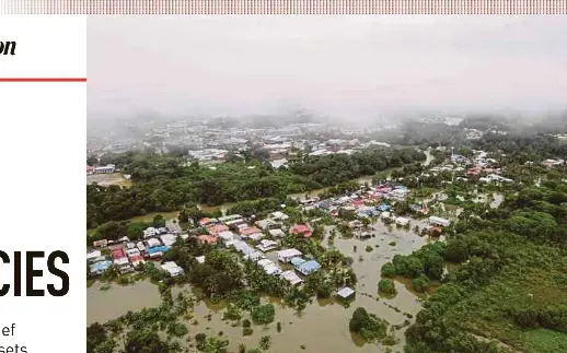  ?? DRONE UNIT PIC COURTESY OF THE CIVIL DEFENCE FORCE’S ?? An aerial view of the flooded Serian district in Sarawak yesterday.