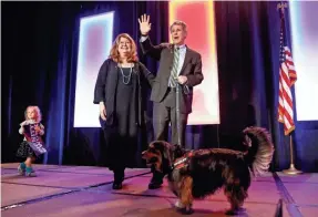  ?? JOHN MINCHILLO/AP FILE ?? Rescue dog Franklin joined Sen. Sherrod Brown, D-Ohio, and his wife, Connie Schultz, at Brown’s election victory celebratio­n in Columbus, Ohio, on Nov. 6, 2018. Franklin appeared in one of Brown’s campaign ads.