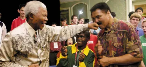  ??  ?? PACKING A PUNCH: Nelson Mandela lands a left on Muhammad Ali’s chin in Dublin. Photo: Ray McManus