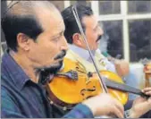  ?? AFP ?? Local musicians perform at a book fair in Mosul, Iraq.