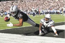  ?? Thearon W. Henderson / Getty Images ?? Raiders wide receiver Michael Crabtree (15) is part of the returning offensive nucleus led by quarterbac­k Derek Carr.