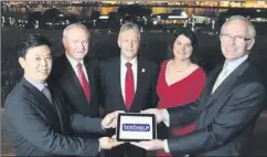  ??  ?? From left: Xiqun Yu-Ceo (Beijing Technology), Deputy First Minister Martin McGuinness, First Minister Peter Robinson, Enterprise Minister Arlene Foster and Mark McCusker, Texthelp