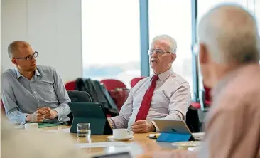  ?? ABIGAIL DOUGHERTY/STUFF ?? Tax Working Group chairman Sir Michael Cullen, centre, now has the job of steering the group towards its final recommenda­tion.