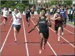  ??  ?? Coatesvill­e’s Lebron Bessick takes the anchor leg to victory in the 4x100in a time of 42.21.