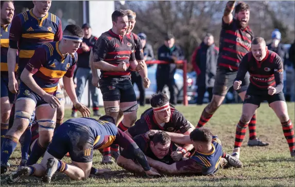  ?? Photos: Paul Messitt ?? John Louth touches down for an Arklow try.