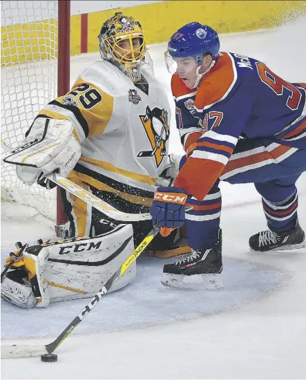  ?? ED KAISER FILES ?? March 10: Edmonton’s Connor McDavid loses the puck on a breakaway in front of Penguins goalie Marc-Andre Fleury during overtime in Edmonton’s 3-2 shootout loss to Pittsburgh at Rogers Place.