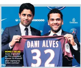  ??  ?? MONEY TALKS Alves is greeted by PSG president Nasser Al-Khelaifi after signing his £24m contract