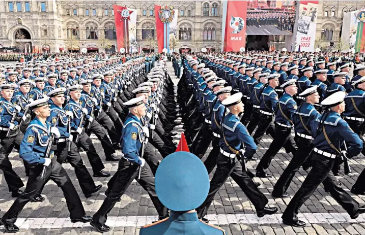  ?? ?? Russian sailors march on Red Square yesterday during the rehearsal for tomorrow’s Victory Day military parade in central Moscow