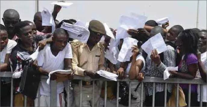  ?? CULLED FROM THECABLE ?? A large crowd of Nigerian youths during 2016 Immigratio­n recruitmen­t exercise