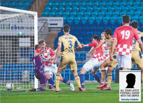  ?? Picture: AAP IMAGE ?? Gold Coast Knights defenders scramble unsuccessf­ully as Newcastle’s Nikolai Topor-Stanley (third from right) scores the lone goal.