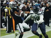  ?? RICK SCUTERI — THE ASSOCIATED PRESS ?? Raiders wide receiver Zay Jones (7) makes a catch against the Seahawks during Saturday’s preseason game.