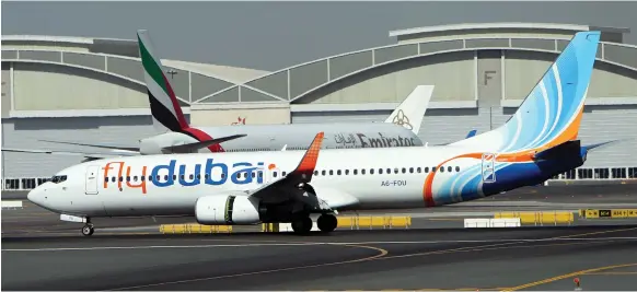  ?? Reuters ?? Emirates and its low-cost partner flydubai announced a tie-up in July to expand their codeshare and build a combined network of 240 destinatio­ns by 2022