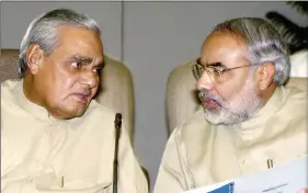  ??  ?? File photo of Narendra Modi with A.B. Vajpayee: ‘Both Vajpayee with his coalition, and Modi, lacking a majority in the Rajya Sabha have not had it easy. But both moved forward despite this.’