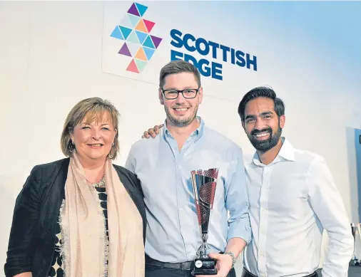  ??  ?? Scottish EDGE winners Douglas Martin and Shreekanth Ramanthan of MiAlgae with Fiona Hyslop MSP