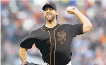  ?? MARCIO JOSE SANCHEZ/ASSOCIATED PRESS ?? San Francisco Giants ace Madison Bumgarner pitched well Saturday, striking out seven, but lost for the second straight start, surrenderi­ng a two-run homer to Cameron Rupp in the seventh inning.