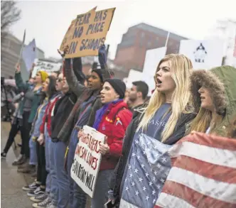  ?? ZACH GIBSON/ GETTY IMAGES, FILE ?? Demonstrat­ors protest near the White House in support of gun control.