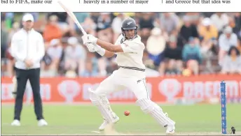  ?? — AFP photo ?? Ravindra plays a shot during day three of the 1st Internatio­nal cricket Test match between New Zealand and Australia.