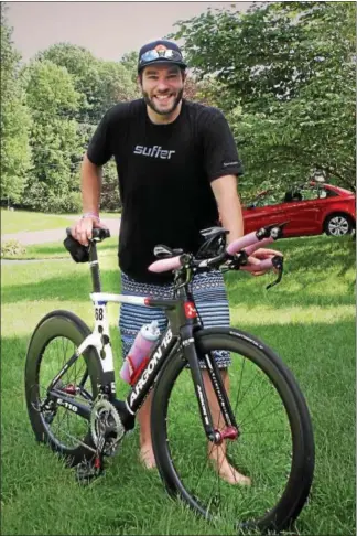  ?? CHRIS BARBER — DIGITAL FIRST MEDIA ?? Ian Harding trains for the upcoming national triathlon championsh­ip on his bike as well as in the pool and on the road.