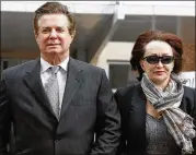  ?? JACQUELYN MARTIN / ASSOCIATED PRESS ?? Paul Manafort (left), President Donald Trump’s former campaign chairman, arrives at the Alexandria Federal Courthouse in Virginia on Thursday with his wife, Kathleen.