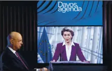  ?? SALVATORE DI NOLFI — KEYSTONE VIA ASSOCIATED PRESS ?? Klaus Schwab, left, executive chairman of the World Economic Forum, listens to European Commission President Ursula von der Leyen during a conference at the Davos Agenda in Geneva, Switzerlan­d, on Tuesday.